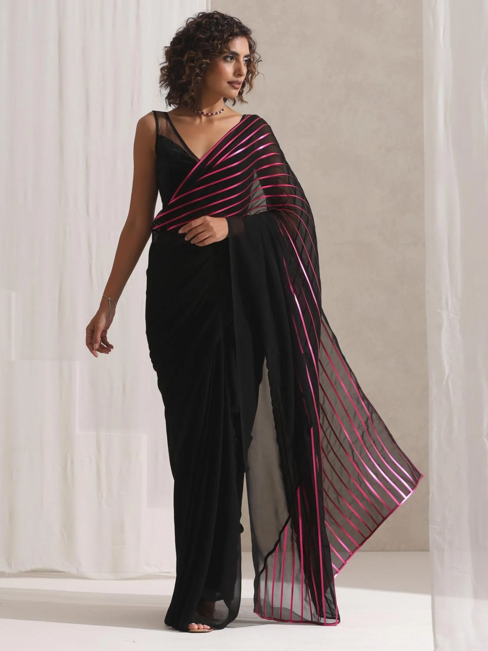 Black and Pink Impression Georgette Saree